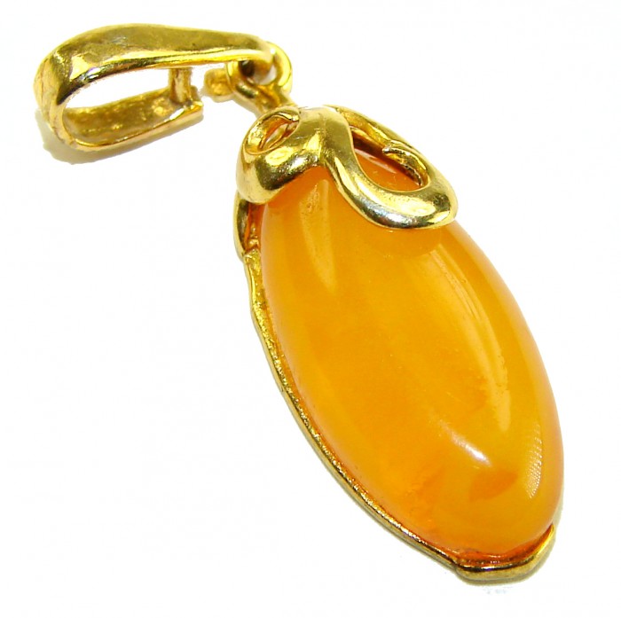 Prehistoric Authentic Baltic Amber .925 Sterling Silver beautifully dipped in 18K GOLD handcrafted Pendant - Baltic amber pendant with gold-toned setting, side view.