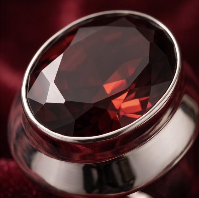 Celestrial Energy Natural 15.4 carat Garnet .925 Sterling Silver handmade Large Statement Ring size 8 - Close-up of a garnet ring in sterling silver setting.