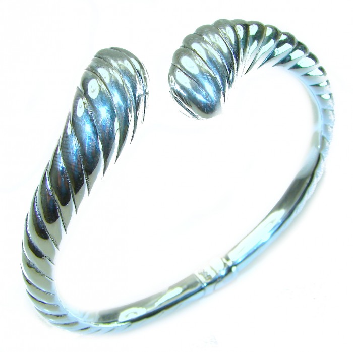 Italy made Bracelet in best quality highly polished .925 Sterling Silver - Close-up of highly polished .925 silver bracelet, open-ended design.