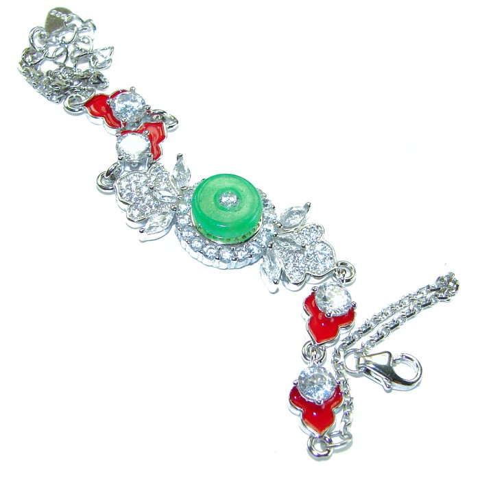 Purity and Harmony Precious genuine 6.5 carat Jade .925 Sterling Silver handcrafted Bracelet - Detailed view of jade bracelet with red accents and floral design.