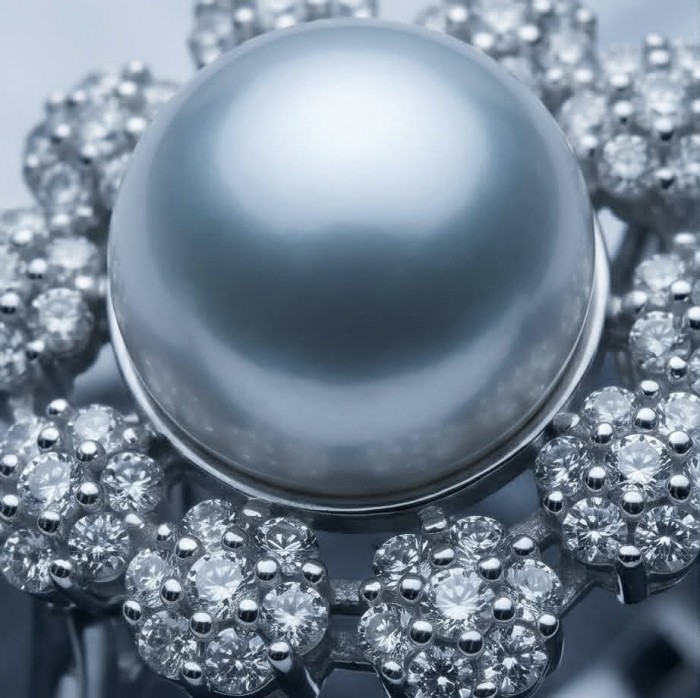 Authentic rare Pearl .925 Sterling Silver handcrafted ring; s. 7 3/4 - Close-up of pearl and diamond arrangement on silver ring.