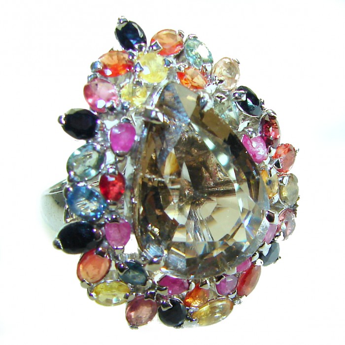 Celestial peace 29.5 carat Champagne Smoky Topaz Sapphire .925 Sterling Silver HUGE Ring size 7 1/4 - Close-up of multicolored gemstone ring with pear-shaped topaz centerpiece.