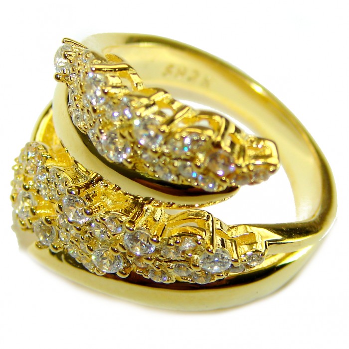 ELEGANT 4.8 carat White Topaz 14k Gold over .925 Sterling Silver brilliantly handcrafted ring s. 6 1/4 - Close-up of gold ring with white topaz stones, overlapping design.