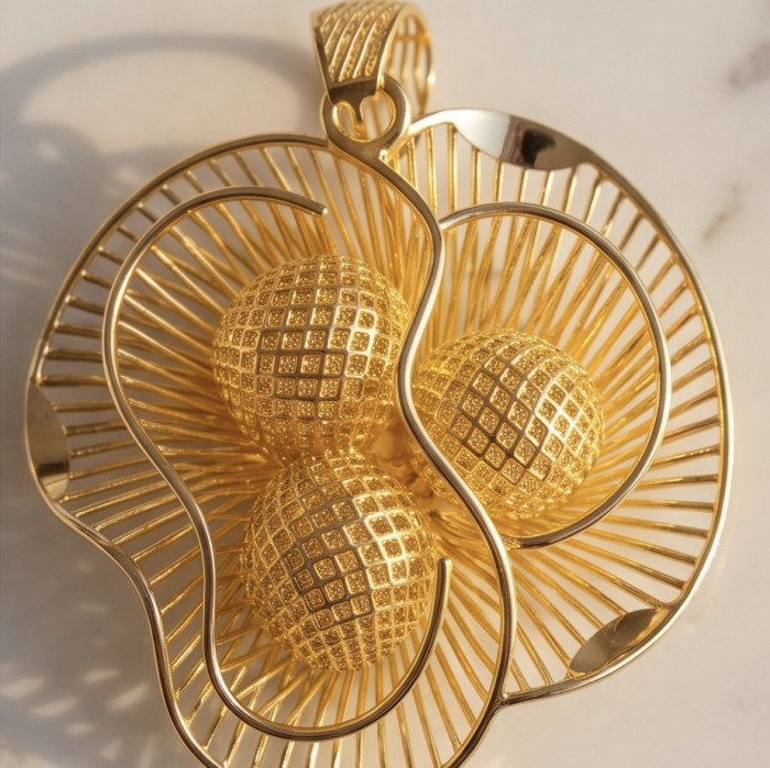 Dubai Style - Blooming Golden Rose .925 Sterling Silver dipped in 22K Gold handmade Pendant - Pendant close-up, Dubai Style Blooming Golden Rose on flat surface.