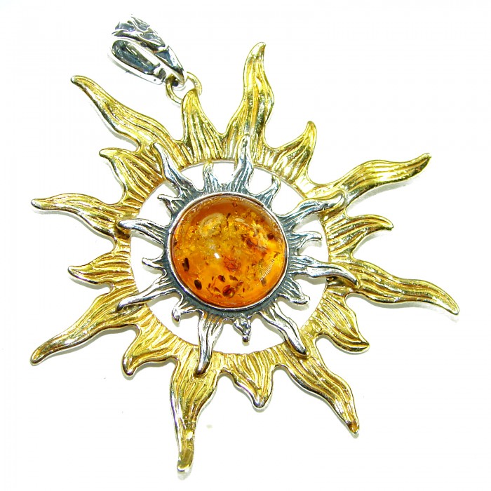 Bright Sun Baltic Polish Amber 14k Gold over .925 Sterling Silver handcrafted Pendant - Sun-shaped pendant with amber stone, top view, gold and silver detailing.
