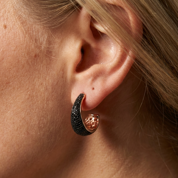 Authentic 6.2 carat Black Diamond 22K Rose Gold over .925 Sterling Silver handcrafted .925 Sterling Silver handcrafted earrings - Close-up of black diamond hoop earring worn on ear
