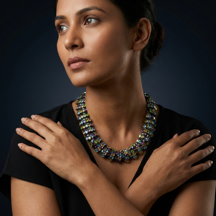 Infinity 285.5 carat Authentic Multigems Black Rhodium over .925 Sterling Silver handcrafted Statement necklace - Side view of woman wearing Infinity 285.5 carat multigems necklace