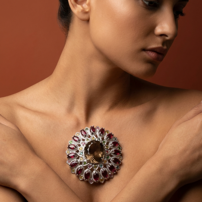 Authentic 45.5 carat carved Smoky Topaz Garnet .925 Sterling Silver handmade Statement Pendant and Brooch - Model wearing large smoky topaz garnet necklace, side view.