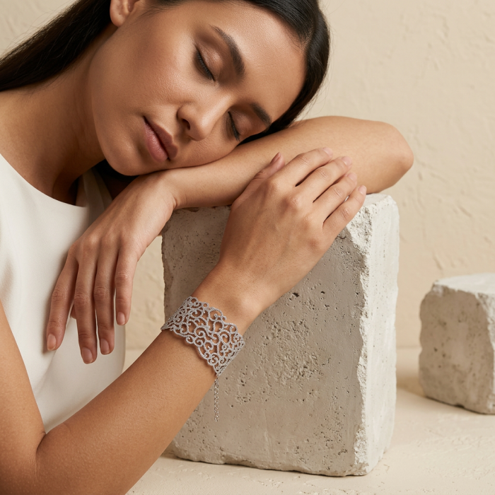 Spectacular! A Million Stars 43.8 carat White Sapphire .925 Sterling Silver Bracelet / Cuff - Woman resting, bracelet worn on wrist, intricate white sapphire design.