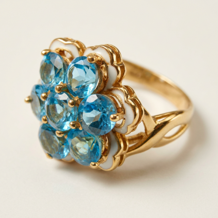Forget-Me-Not Authentic 18.7 carat Swiss Blue Topaz white Enamel .925 Sterling Silver dipped in 22K Gold handcrafted Large ring size 7 3/4 - Side view of ring with Swiss Blue Topaz stones and gold setting.