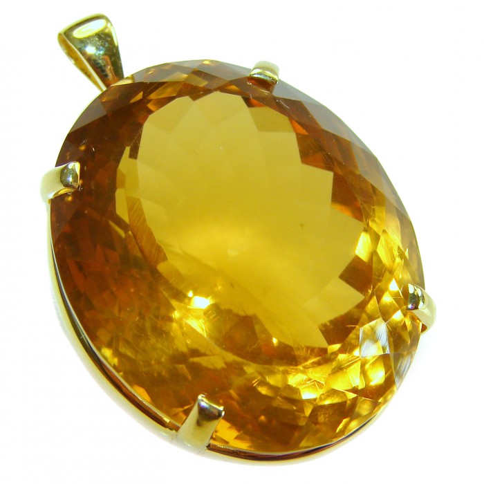 Luxury genuine 47.7CARAT oval cut Champagne Topaz .925 Sterling Silver dipped in 22K Gold handmade Pendant - Close-up of luxury 47.7 carat oval cut champagne topaz pendant