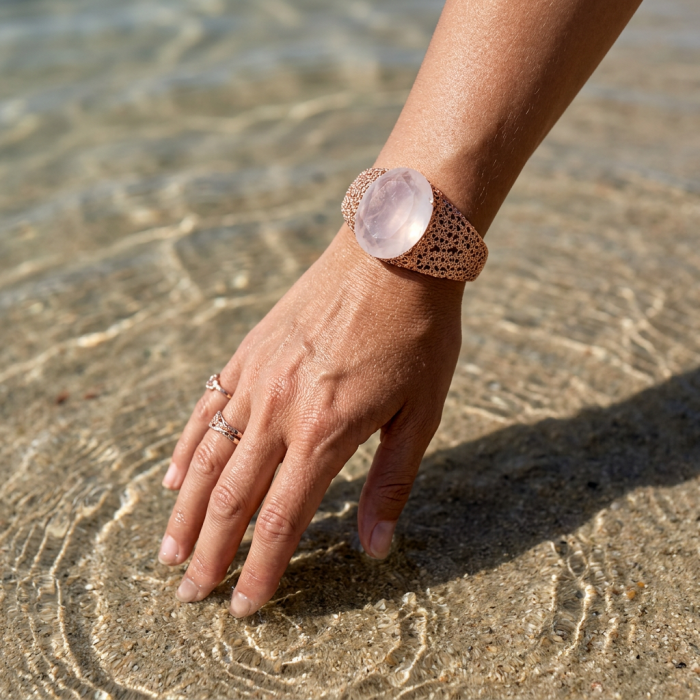 Vintage Beauty Genuine 42.2 carat Brazilian Rose Quartz Rose quartz 22K Rose Gold over .925 Sterling Silver handcrafted Bracelet / Cuff - Rose quartz bracelet on hand in water, side view, vintage style.
