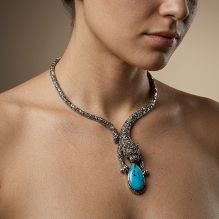 La panthere Turquoise Marcasite .925 Sterling Silver handcrafted SPECTACULAR necklace - Close-up of La Panthere necklace with turquoise stone, worn on neck.