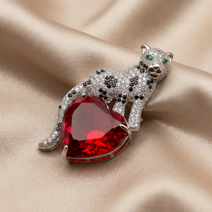 Passionate Love Cheetah authentic 42.5 carat Ruby .925 Sterling Silver Handcrafted pendant brooch - Cheetah pendant with 42.5 ct ruby on satin background, front view.