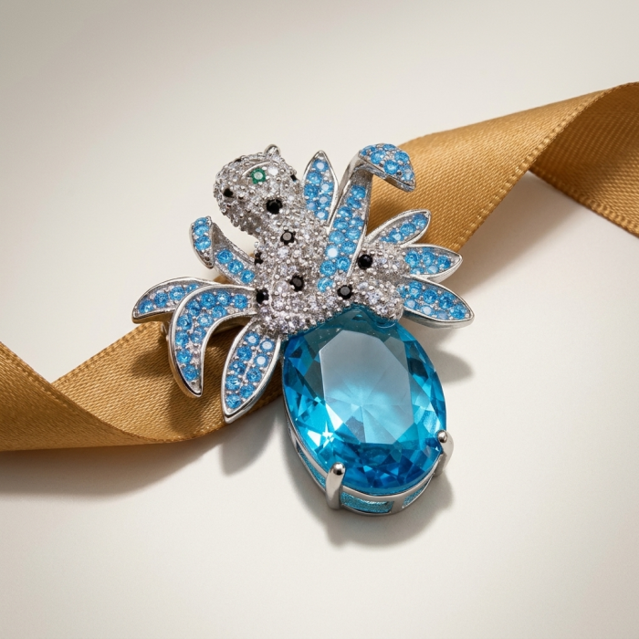 Blue Cheetah authentic 12.5 carat Swiss Blue Topaz .925 Sterling Silver Handcrafted pendant brooch - Brooch featuring blue topaz and cheetah design, top view.