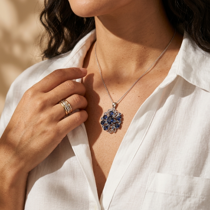 Authentic 17.8 carat African Kyanite .925 Sterling Silver handmade pendant brooch - Pendant necklace worn, close-up on chest.