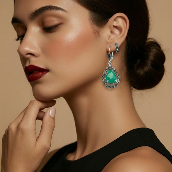 Stella - Very Unique authentic 12.5 carat Jade .925 Sterling Silver handcrafted earrings - Side view of woman wearing Stella jade drop earrings in silver setting.