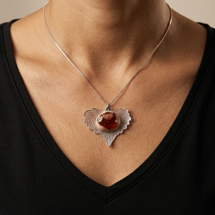 Rain Drop REAL Leaf dipped in Sterling Silver and 25.5 carat Mexican Opal & .925 Sterling Silver Pendant - Necklace worn, featuring silver leaf with red stone centerpiece.