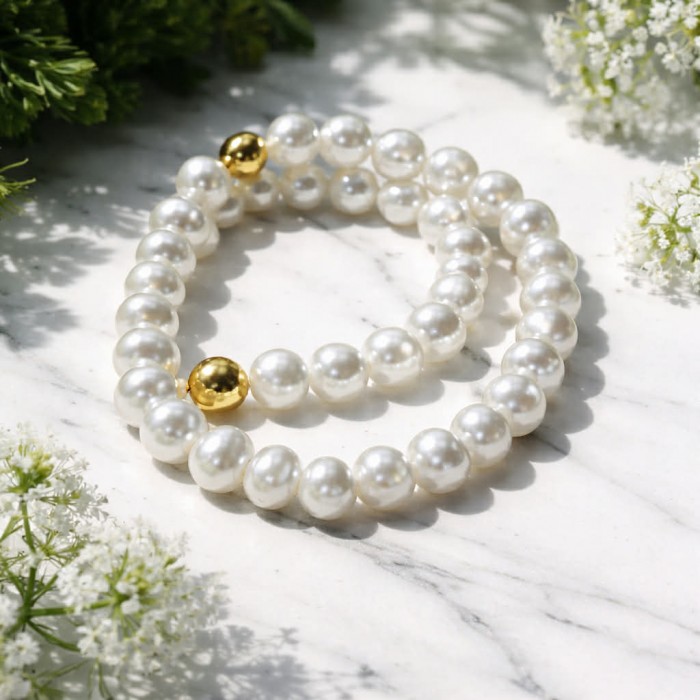 Baroque style 16 inches long Freshwater Pearl 10K Gold over .925 Sterling Silver handmade Necklace - Freshwater pearl necklace with gold detail on marble surface
