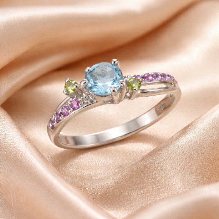 Pacifica 1.8 carat authentic Swiss Blue Topaz .925 Sterling Silver handmade Statement Ring size 9 - Side view, Pacifica Swiss Blue Topaz ring on satin background