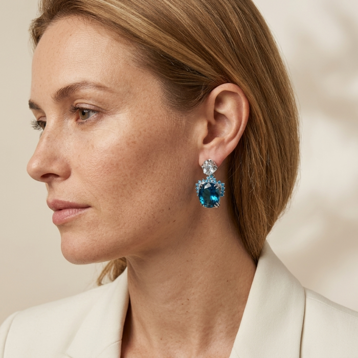 Andrea 24.5 carat London Blue Topaz Aquamarine .925 Sterling Silver handmade earrings - Side view, woman wearing Andrea 24.5 ct London Blue Topaz earrings.