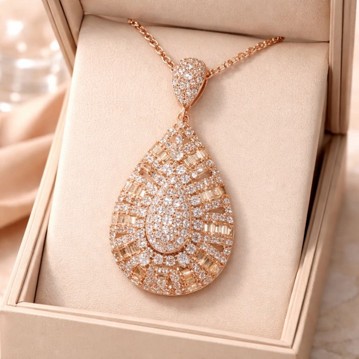 Luxurious pave 5.2 carat White Topaz .925 Sterling Silver dipped in 18K Rose Gold handmade Pendant - Teardrop pendant, pave white topaz, front view, in box.
