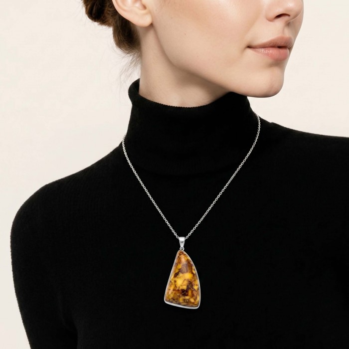 Prehistoric Authentic Baltic Amber .925 Sterling Silver beautifully handcrafted Pendant - Amber pendant necklace on model wearing black turtleneck.
