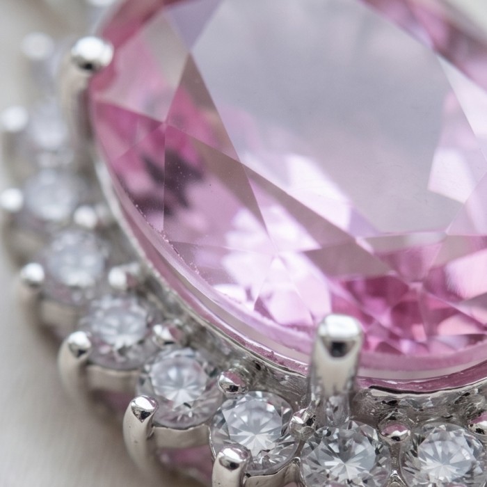 Incredible oval cut 15.8 carat Pink Sapphire .925 Sterling Silver handcrafted pendant - Close-up of 15.8 carat pink sapphire with diamond accents