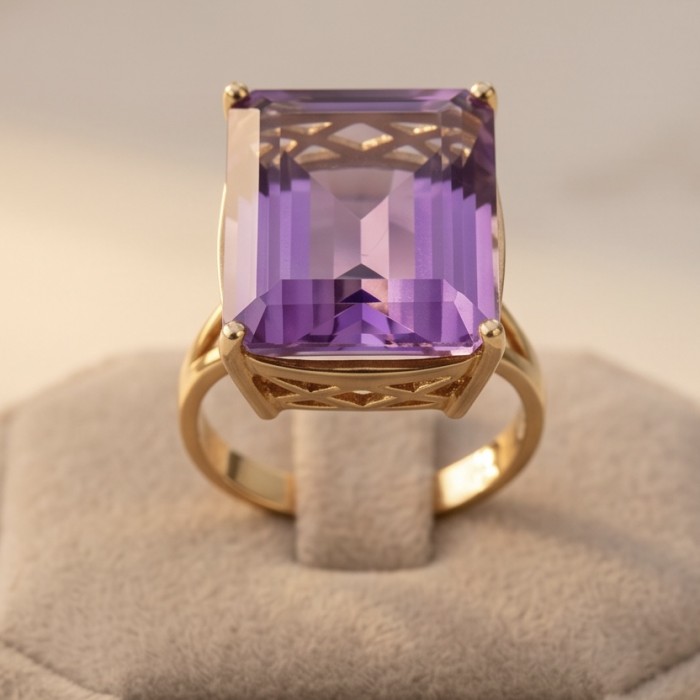 Empress of Uruguay 31.2 carat natural Amethyst .925 Sterling Silver dipped in 22K Gold Handcrafted Ring size 7 - Amethyst ring close-up on stand, gold setting, 31.2 carat stone.