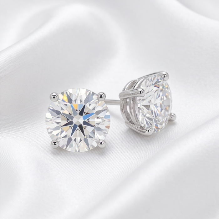 Angelina 8.9 carat authentic White Topaz .925 Sterling Silver Handcrafted Earrings - Side view of Angelina 8.9 carat white topaz earrings on satin background.
