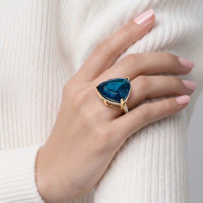 Atlantica rare trillion cut 10.9 carat authentic London Blue Topaz 22K Gold over .925 Sterling Silver Handcrafted Ring size 6 1/4 - Hand wearing Atlantica trillion cut 10.9 carat London Blue ring