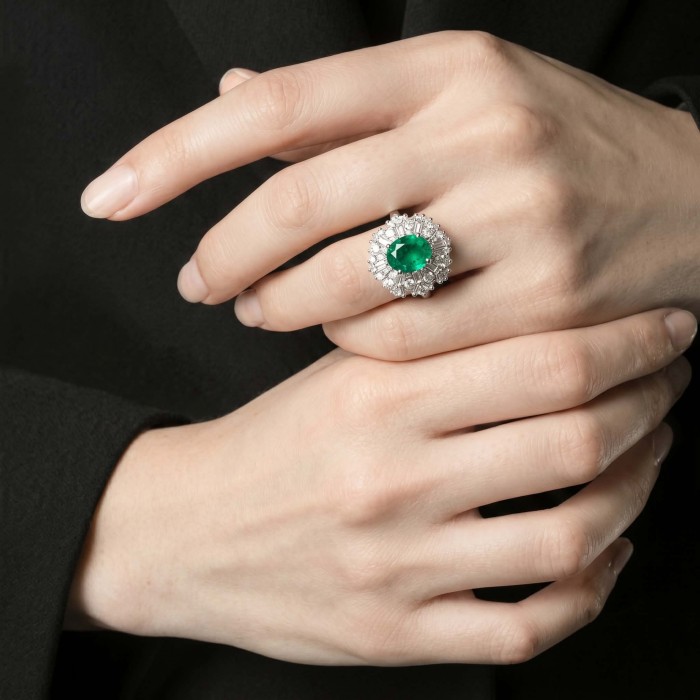 Elizabeth 4.8 carat Colombian Emerald .925 Sterling Silver dipped in Rhodium handcrafted Ring size 7 1/2 - Emerald ring with diamonds worn on hand, close-up view.