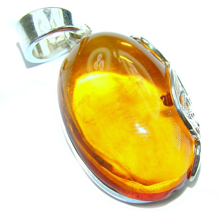 Authentic Golden Baltic Amber .925 Sterling Silver beautifully handcrafted Pendant - photo 1