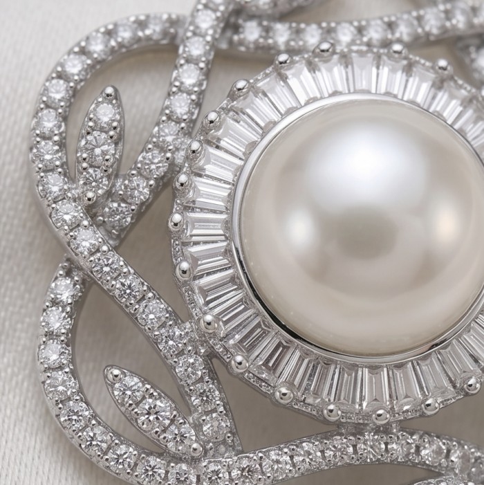 BLOOMING FLOWERS Genuine Pearl 0.2 CARAT lab grown Diamond rhodium over .925 Sterling Silver handcrafted Statement Earrings - Close-up of BLOOMING FLOWERS pearl and diamond jewelry detailing.