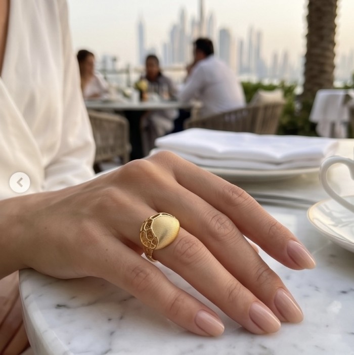 Dubai Style .925 Sterling Silver dipped in 22K Gold handmade Large ring size 9 - Gold ring worn on hand with cityscape background.