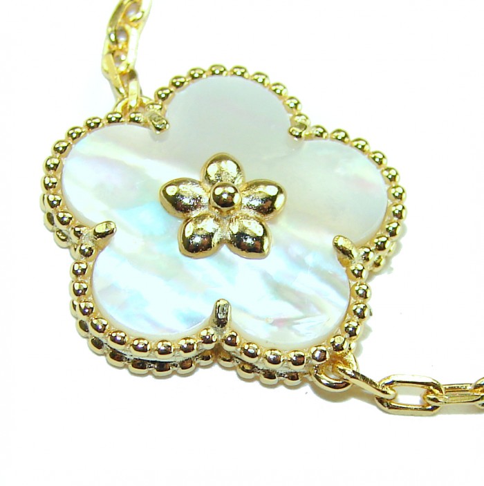 Fantastic Blister Pearl 14K Gold over .925 Silver handmade Bracelet - Close-up of flower-shaped blister pearl pendant with gold detailing.