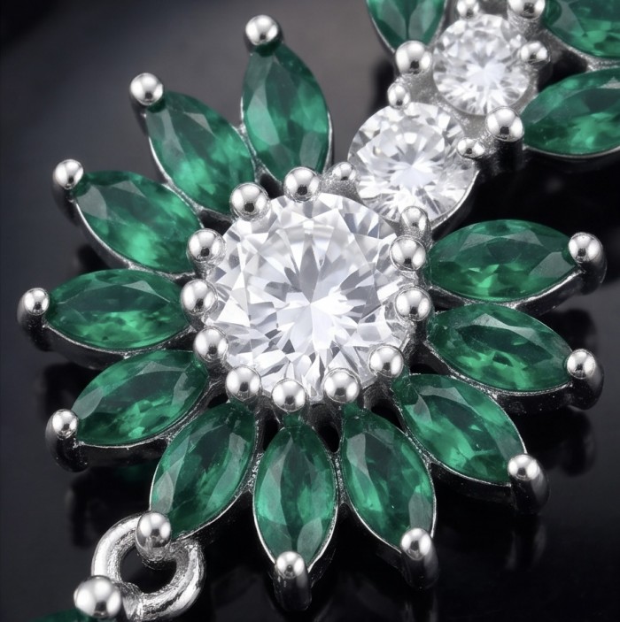 Giovanna - Authentic 7.9 carat COLOMBIAN EMERALD .925 Sterling Silver handcrafted earrings - Close-up of Giovanna Colombian emerald and sterling silver jewelry.