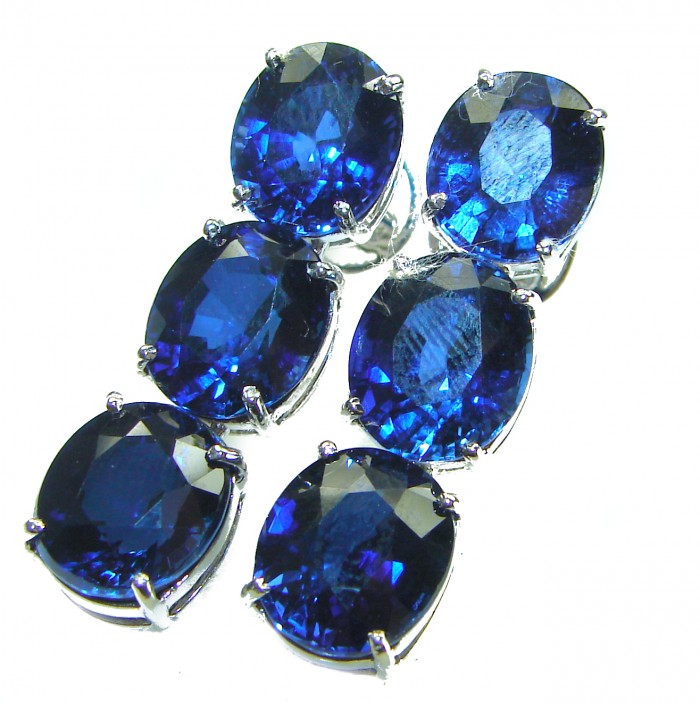 Deep Ocean 16.5 carat London Blue Topaz .925 Sterling Silver handmade Statement earrings - Close-up of Deep Ocean London Blue Topaz stones in sterling silver setting.