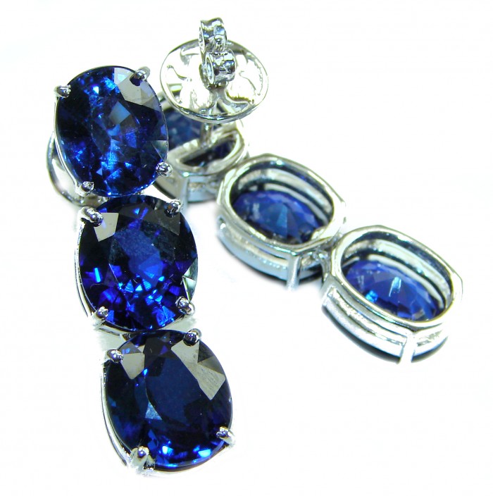 Deep Ocean 22.5 carat London Blue Topaz .925 Sterling Silver handmade Statement earrings - Close-up of Deep Ocean London Blue Topaz earrings in sterling silver.