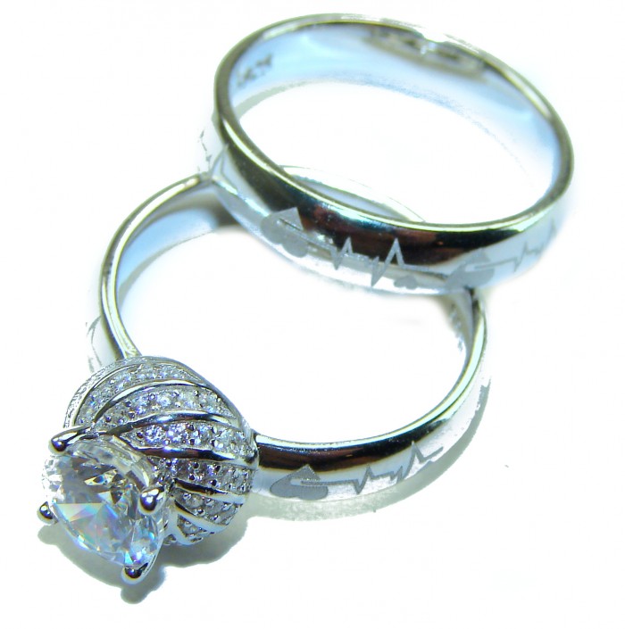 6.8 carat White Topaz .925 Sterling Silver brilliantly handcrafted stack ring s. 7 1/4 - Two sterling silver rings with topaz, one featuring a heartbeat design.