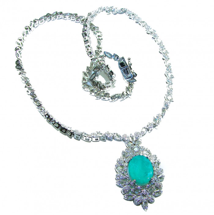 Giovanna 10.2 carat authentic Emerald rhodium over .925 Sterling Silver handcrafted Statement necklace - Necklace with emerald pendant and intricate clasp detail, overhead view.