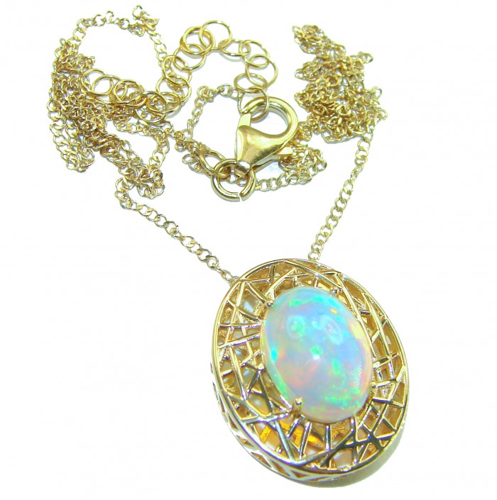 Earth Treasure Authentic 16.8 carat Golden Ethiopian Opal 22K Gold over .925 Sterling Silver handcrafted Statament Necklace - Opal pendant and chain with clasp detail, vivid gemstone colors.