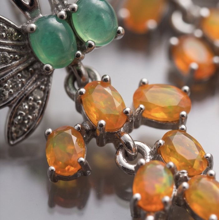 Valentina 5.9 carat Natural Orange Opal rhodium over .925 Sterling Silver handcrafted earrings - Close-up of Valentina 5.9 carat orange opal with rhodium setting.
