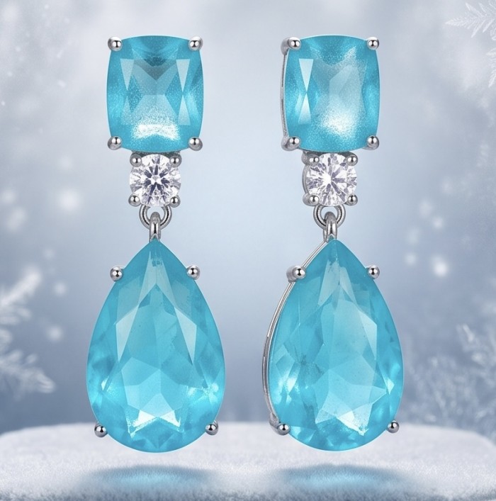 Divine Beauty 18.5 carat Aquamarine .925 Sterling Silver Handcrafted .925 Sterling Silver handcrafted EARRINGS - Aquamarine drop earrings front view on frosty background