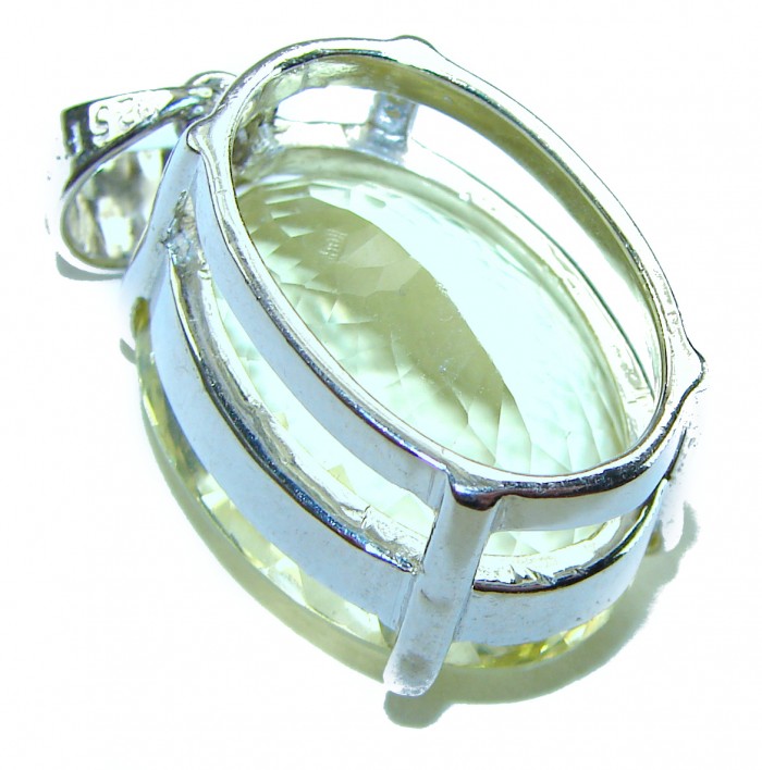 Perfection Oval cut 25.3 carat Lemon Quartz .925 Sterling Silver handcrafted pendant - Side view of 25.3 carat Lemon Quartz pendant in .925 Sterling Silver.