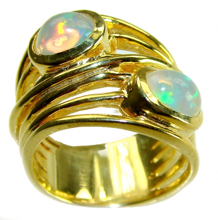 Golden Galaxy Genuine 7.8 carat Ethiopian Opal 14K White Gold over .925 Sterling Silver handmade Ring size 8 - Gold ring with two Ethiopian opals, side angle view.