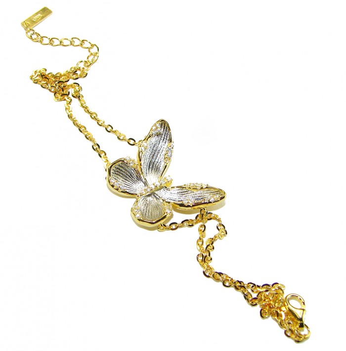 Golden Butterfly White Topaz highly polished 18K Gold over .925 Sterling Silver Italy made bracelet - Golden butterfly bracelet with white topaz, angled view against white background.