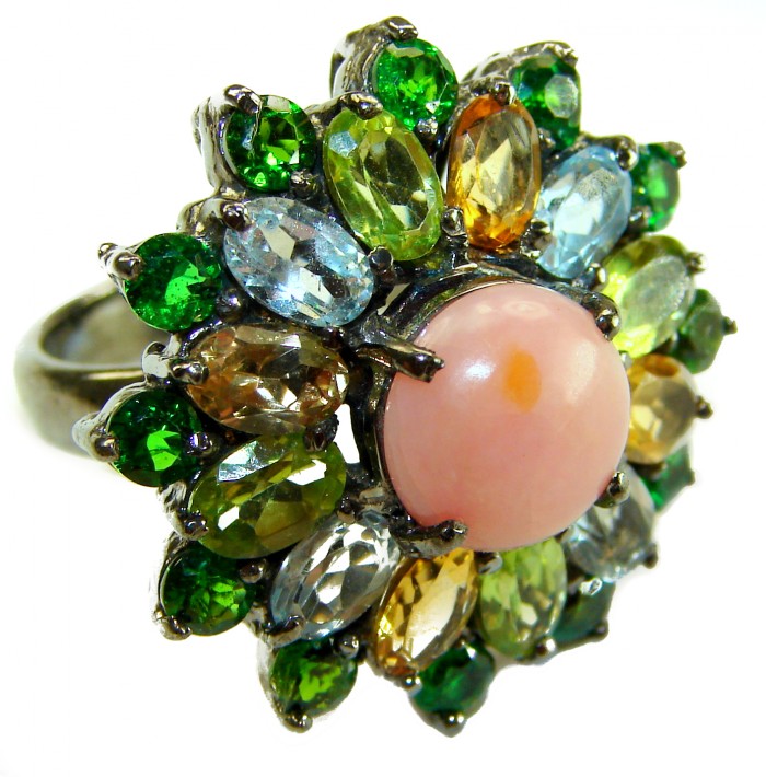 Stella 22.5 carat Pink Opal black rhodium over .925 Sterling Silver handcrafted Ring size 7 3/4 - Close-up of Stella pink opal ring with multicolored gemstones.