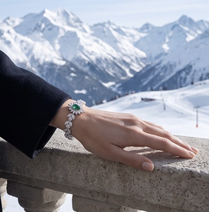 Giovanna - Authentic 4.5 carat Colombian Emerlad .925 Sterling Silver handcrafted Statement bracelet - Emerald bracelet worn on hand with snowy mountain background