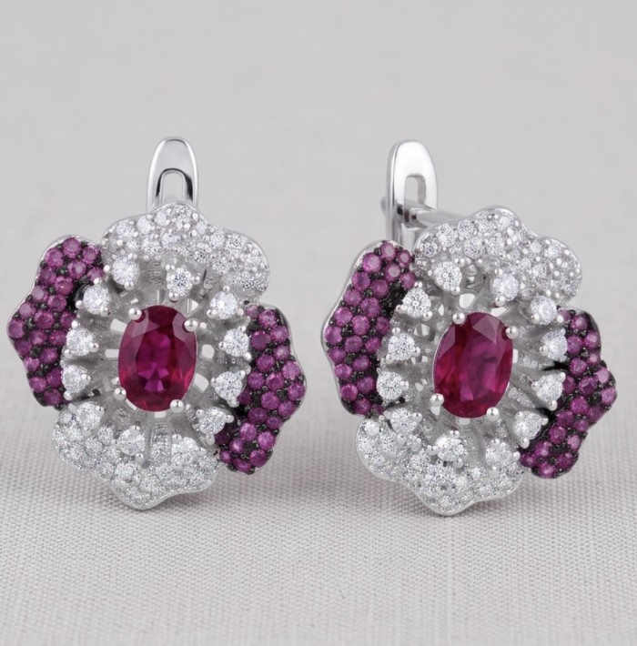 Natural 4.2 carat Mozambique Ruby .925 Sterling Silver dipped in 22K Gold Handcrafted Earrings - Close-up of floral ruby and diamond earrings in sterling silver.